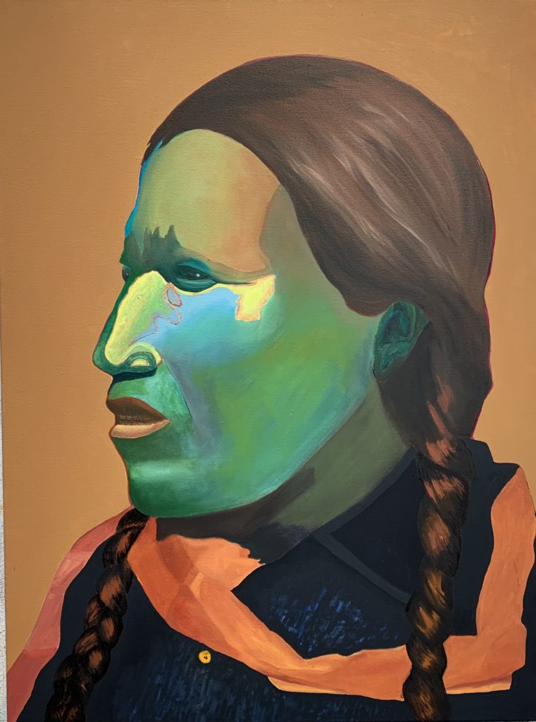 A painting of an Apache Man with a green face.